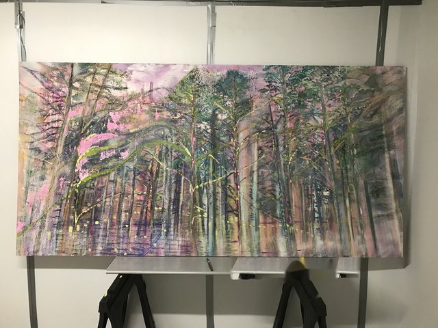 Woodland painting in progress: pine trunks emerging