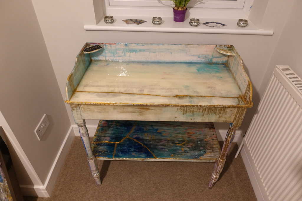 Console table with white and blue poured resin top