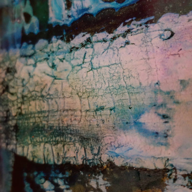 Macro detail: white crackle with a blue band