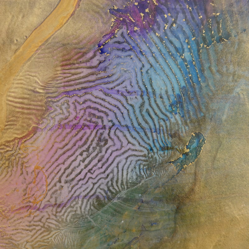 Macro detail: gold veil, fingerprint ripples