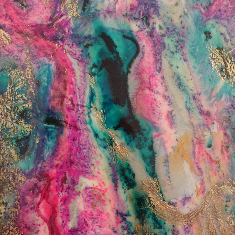 Macro detail: pink and teal veins over gold leaf